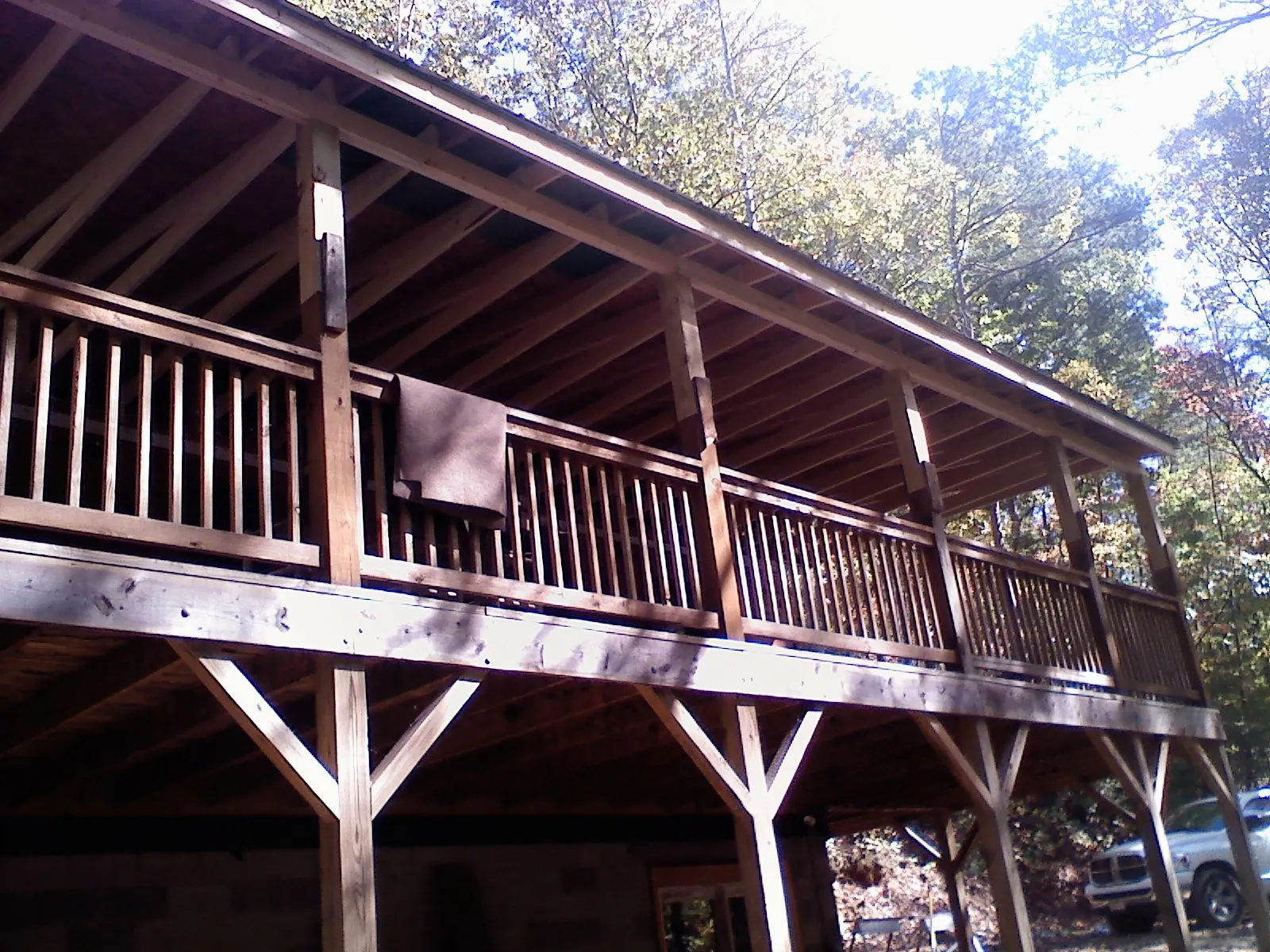 Timber framing under a new elevated porch and deck — Roof Leak Repair in Mineola by Roofing Brothers